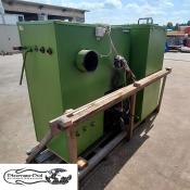 Kocioł c.o. Kotrem o mocy 45 kW, zasilany pelletem, rok produkcji 2011 - zbliżenie na tylną część i mechanizm podajnika.